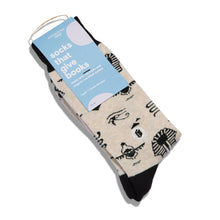 Load image into Gallery viewer, Socks that Give Books  (Ivory Hieroglyphics)